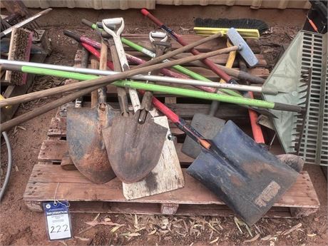 Pallet of shovels, rakes and brooms