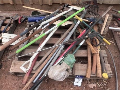 Pallet of shovels, axes, rakes and broom