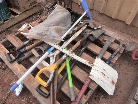 Pallet of shovels, axes, broom and pick