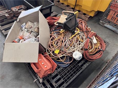Extension leads and plugs on pallet