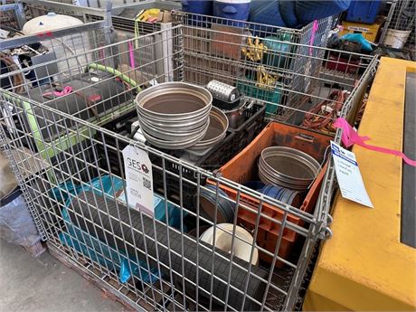 Kitchen camping items and exploration sieves in pallet cage
